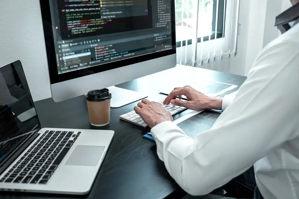 young-programmer-working-software-javascript-computer-it-office